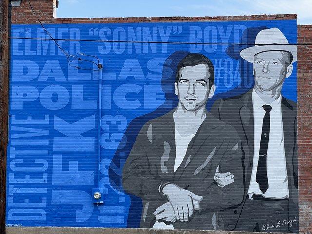 A closer view of the Sonny Boyd mural, showing Oswald and Boyd, painted from the same photograph