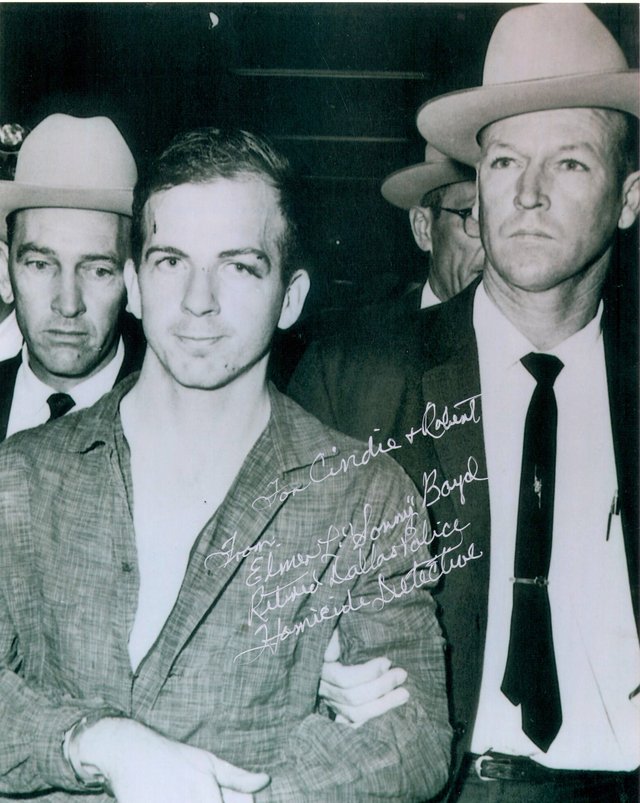 The press photograph the mural is painted from, inscribed by Boyd: For Cindie and Robert, from Elmer L. Sonny Boyd, Retired Dallas Police Homicide Detective
