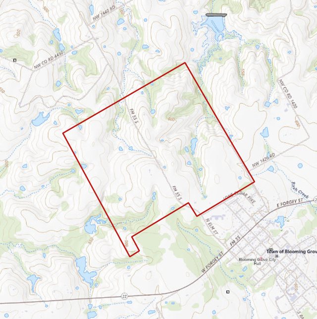 Today's topographic map around the Cazneau survey, outlined in red: FM 55 crossing it, stock ponds, and Blooming Grove at its southeast corner