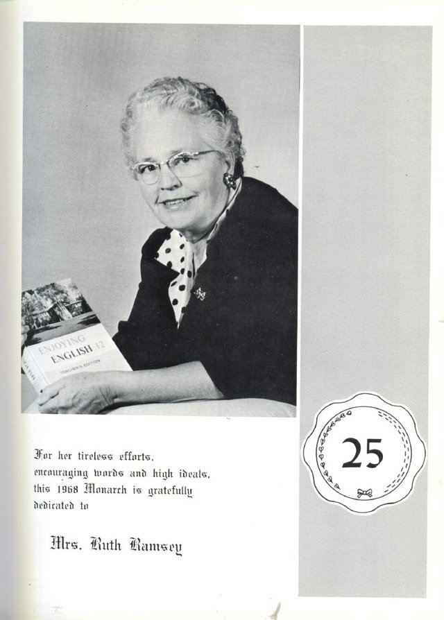 Ruth Ramsey, seated, holding a copy of Enjoying English 12, Teacher's Edition, from the 1968 Monarch